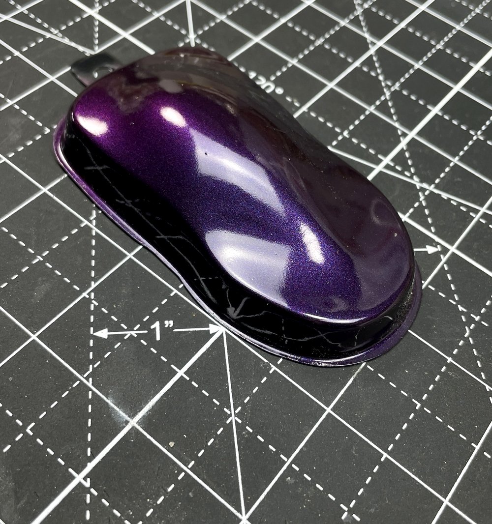 Speed shape painted in a deep purple pearl with gloss clear
