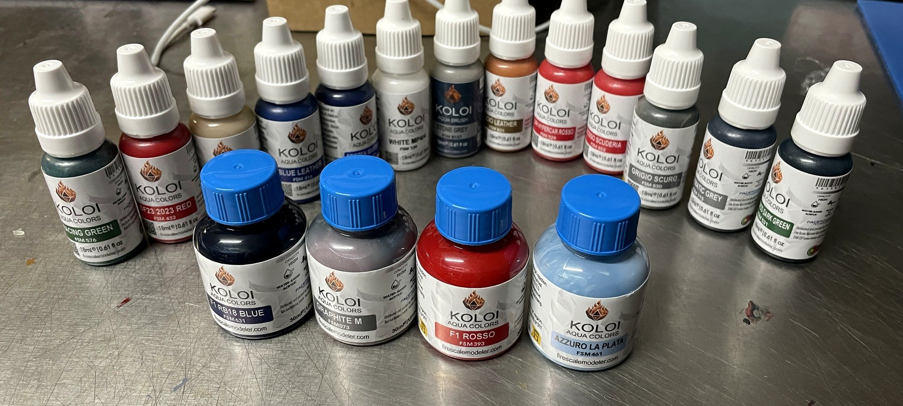 Range of Koloi Aqua Colors bottles in 18 ml and 30 ml sizes