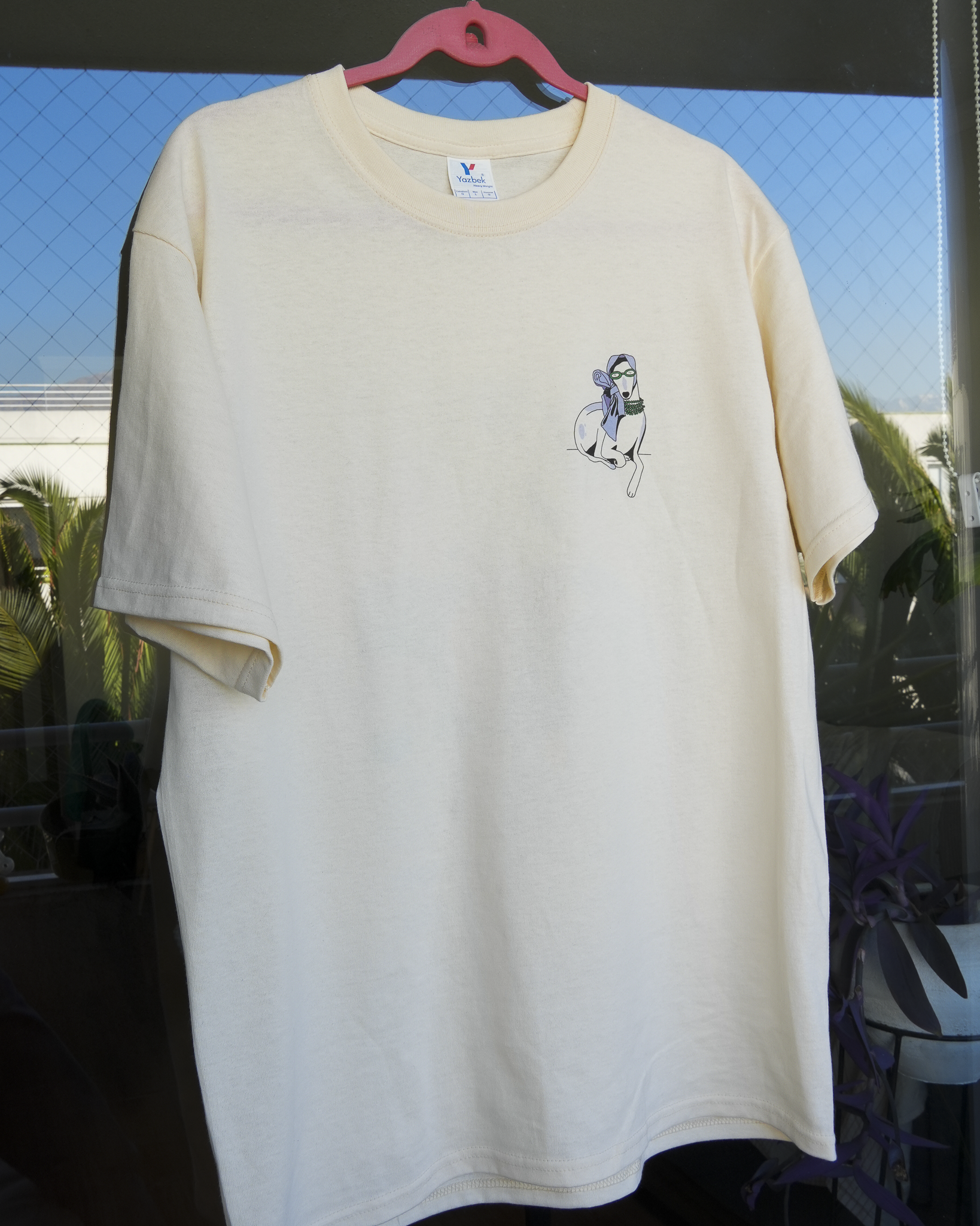 Polera Agarra tus maletas (versión crema)